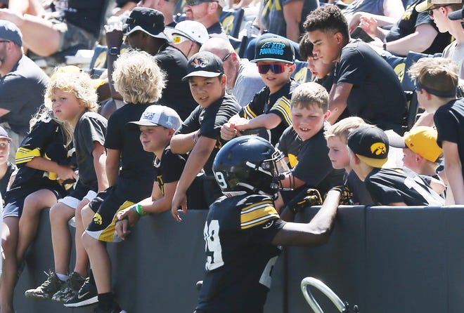 Iowaw wide-receiver Judah Mallette (29) talks to fans during scrimmage in the Kids' Day at Kinnick Stadium on Saturday, Aug. 12, 2023, Iowa City, Iowa