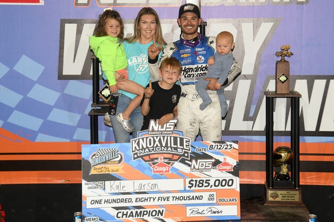 Kyle Larson celebrates with his family in victory lane after winning the 2023 Knoxville Nationals.