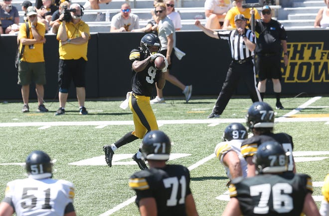 Iowa running back Jazium Patterson (9) catches the ball during a scrimmage in the Kids' Day at Stadium on Saturday, Aug. 12, 2023, Iowa City, Iowa