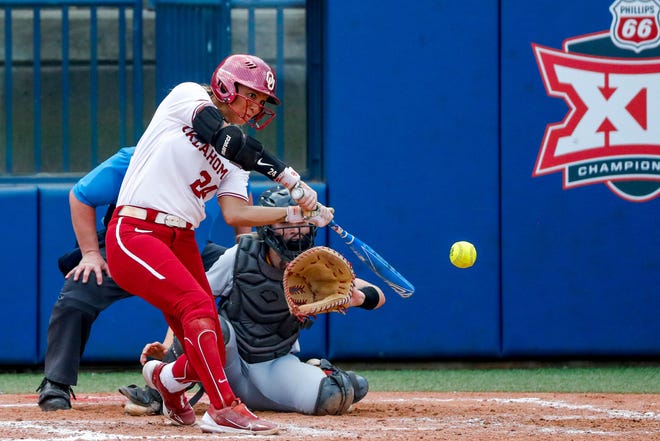 Oklahoma outfielder Jayda Coleman (24) hits a home run during the Big 12 softball tournament game between the Oklahoma Sooners and the Iowa State Cyclones at USA Softball Hall of Fame Stadium in Oklahoma City, on Friday, May 12, 2023.
