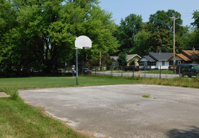 The Greenleaf Center plans to spruce up an existing basketball court and add a pergola nearby for shade in the summer.