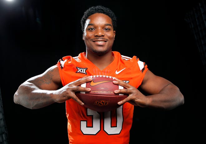 Oklahoma State's Collin Oliver poses for a photograph during media for the Oklahoma State University Cowboys football media days in Stillwater, Okla., Saturday, Aug., 5, 2023.