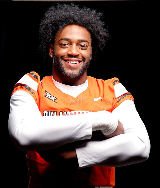 Oklahoma State's Xavier Benson poses for a photograph during media for the Oklahoma State University Cowboys football media days in Stillwater, Okla., Saturday, Aug., 5, 2023.