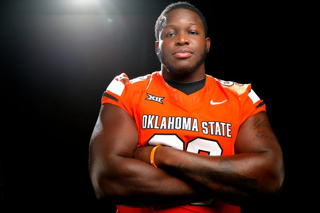 Oklahoma State's Collin Clay poses for a photo during media for the Oklahoma State University Cowboys football media days in Stillwater, Okla., Saturday, Aug., 5, 2023.