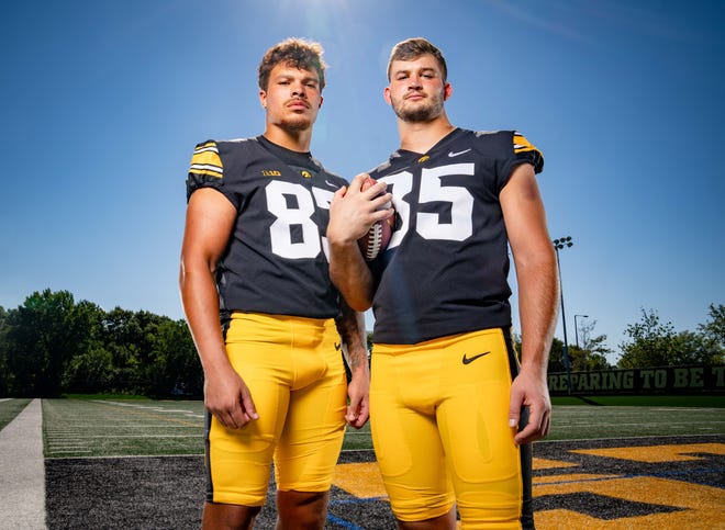 Tight ends Erick All (#83), and Luke Lachey (#85) stand for a photo during Hawkeyes Football media day in Iowa City, Friday, Aug. 11, 2023.
