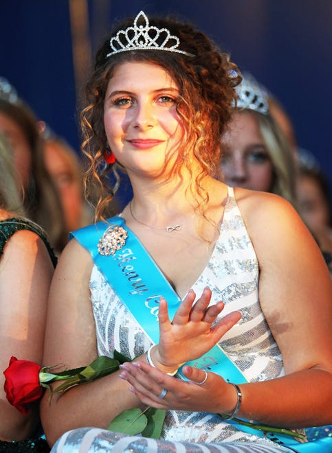 Kalayna Durr of Henry Country claps as other contestants are introduced during the annual Iowa State Fair Queen Coronation on the Anne and Bill Riley Stage at the Iowa State Fair on Saturday, Aug. 12, 2023, in Des Moines.