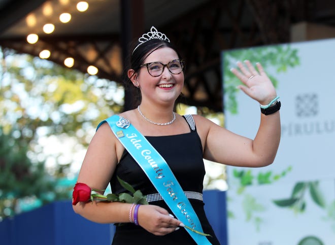 Margo McMillen of Ida County waves during the annual Iowa State Fair Queen Coronation on the Anne and Bill Riley Stage at the Iowa State Fair on Saturday, August 12, 2023, in Des Moines.