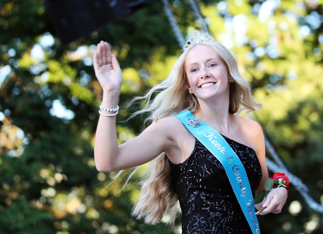 Chloe Zittergruen of Keokuk County Fair waves during the annual Iowa State Fair Queen Coronation on the Anne and Bill Riley Stage at the Iowa State Fair on Saturday, August 12, 2023, in Des Moines.