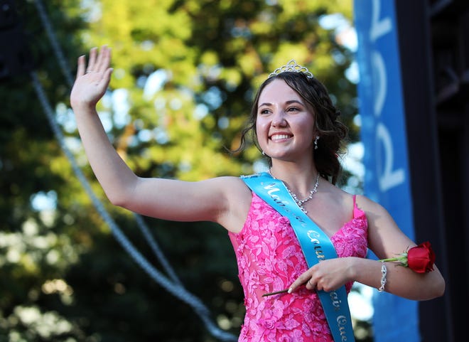 Aliveah Brinegar of Mahaska County waves during the annual Iowa State Fair Queen Coronation on the Anne and Bill Riley Stage at the Iowa State Fair on Saturday, August 12, 2023, in Des Moines.