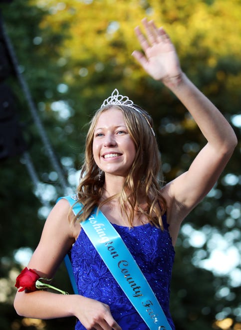 Taylor Bartholomew of Washington County waves during the annual Iowa State Fair Queen Coronation on the Anne and Bill Riley Stage at the Iowa State Fair on Saturday, August 12, 2023, in Des Moines.