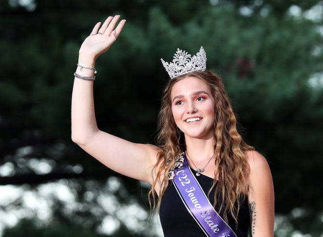 The 2022 State Fair Queen Mary Ann Fox waves to the crowd during the annual Iowa State Fair Queen Coronation on the Anne and Bill Riley Stage at the Iowa State Fair on Saturday, August 12, 2023, in Des Moines.