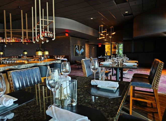 The dining area on the second floor with a bar centering the space has a bit more casual approach at Ruth's Chris Steak House in West Des Moines. The 15,000-square-foot restaurant opens on Aug. 14, 2023.