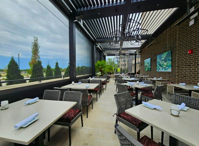 The first floor patio sits along Jordan Creek Parkway with misters and heaters at Ruth's Chris Steak House in West Des Moines. The 15,000-square-foot restaurant opens on Aug. 14, 2023.