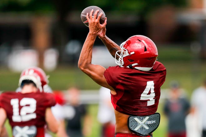 Nic Anderson (4) runs drills during OU football practice in Norman, Okla., on Monday, Aug. 14, 2023.