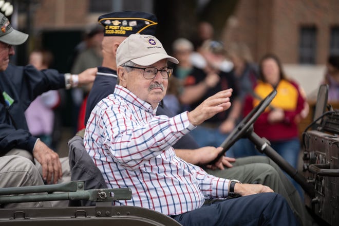 Former Iowa Governor and U.S. Ambassador to China Terry Branstad rides down the Grand Concourse of the Iowa State Fair during the Veteran's Day Parade, on Monday, Aug. 14, 2023, in Des Moines.
