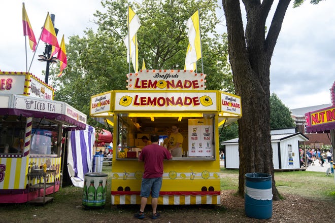 Brafford's Lemonade Stand prepares and sells lemonade at the Iowa State Fair, on Monday, Aug. 14, 2023, in Des Moines.