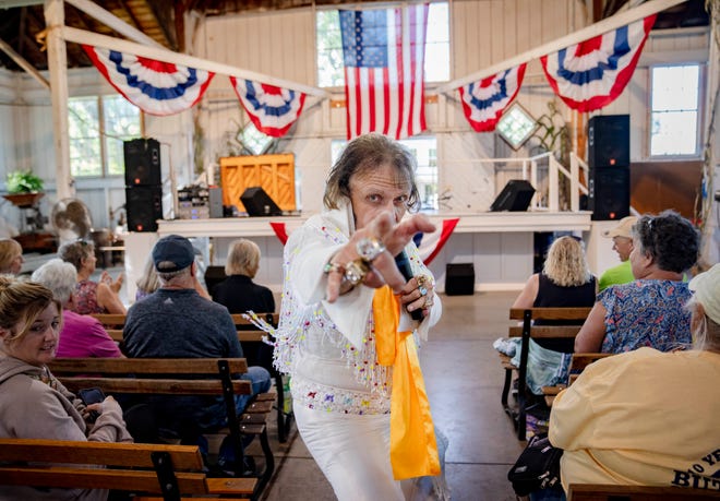 James David Brown performs an Elvis Presley Tribute and Impersonation at Farm Bureau Pioneer Hall during the Iowa State Fair, Monday, Aug. 14, 2023.