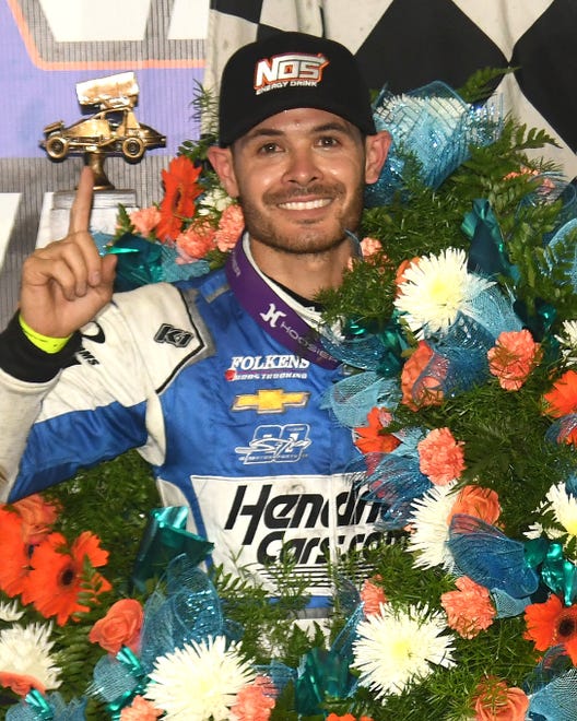 Kyle Larson celebrates in victory lane after winning the 2023 Knoxville Nationals.