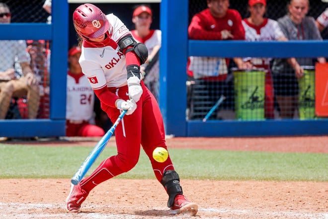 Oklahoma shortstop Grace Lyons (3) hits a home run during the Big 12 softball tournament game between the Oklahoma Sooners and the Iowa State Cyclones at USA Softball Hall of Fame Stadium in Oklahoma City, on Friday, May 12, 2023.
