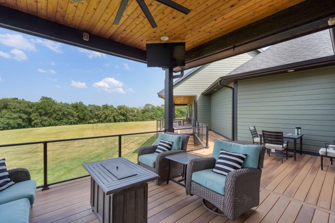 Make yourself at home in this custom-built house in Winterset. The modern home offers 4,435 square feet of living space with a patio and deck area, as well as a separate guest house on the same property.