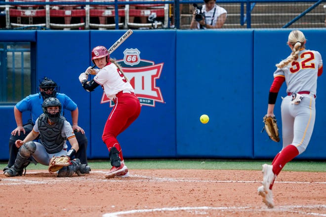 Oklahoma catcher Kinzie Hansen (9) hits during the Big 12 softball tournament game between the Oklahoma Sooners and the Iowa State Cyclones at USA Softball Hall of Fame Stadium in Oklahoma City, on Friday, May 12, 2023.
