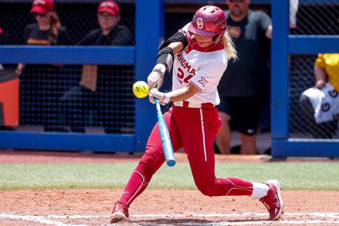 Oklahoma outfielder Jayda Coleman (24) hits during the Big 12 softball tournament game between the Oklahoma Sooners and the Iowa State Cyclones at USA Softball Hall of Fame Stadium in Oklahoma City, on Friday, May 12, 2023.