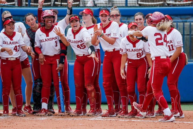 Oklahoma outfielder Jayda Coleman (24) celebrates with the team after hitting abhor run during the Big 12 softball tournament game between the Oklahoma Sooners and the Iowa State Cyclones at USA Softball Hall of Fame Stadium in Oklahoma City, on Friday, May 12, 2023.