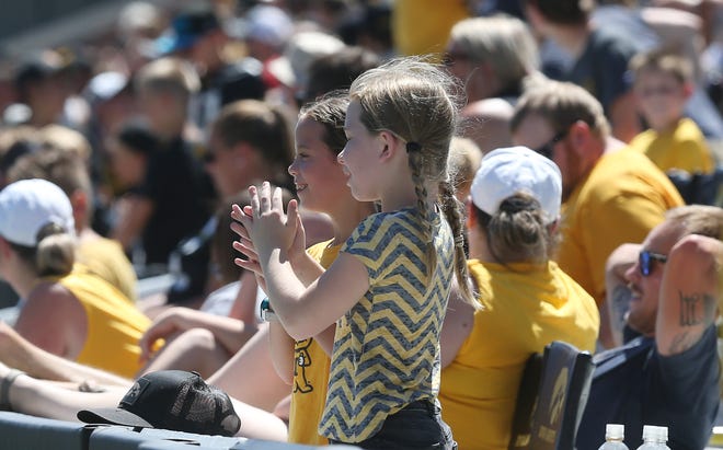 Fans cheer during scrimmage in the Kids' Day at Kinnick Stadium on Saturday, Aug. 12, 2023, Iowa City, Iowa