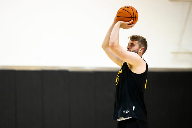 Iowa forward Ben Krikke warms up before a summer practice earlier this summer in Iowa City. Krikke helped lead the Hawkeyes to a win over the Barcelona All-Star on Monday.