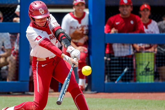 Oklahoma second baseman Tiare Jennings (23) hits during the Big 12 softball tournament game between the Oklahoma Sooners and the Iowa State Cyclones at USA Softball Hall of Fame Stadium in Oklahoma City, on Friday, May 12, 2023.