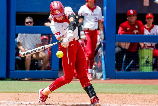 Oklahoma catcher Kinzie Hansen (9) hits during the Big 12 softball tournament game between the Oklahoma Sooners and the Iowa State Cyclones at USA Softball Hall of Fame Stadium in Oklahoma City, on Friday, May 12, 2023.