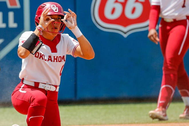 Oklahoma outfielder Rylie Boone (0) celebrates after scoring during the Big 12 softball tournament game between the Oklahoma Sooners and the Iowa State Cyclones at USA Softball Hall of Fame Stadium in Oklahoma City, on Friday, May 12, 2023.