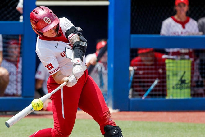 Oklahoma utility Hayley Lee (45) hits during the Big 12 softball tournament game between the Oklahoma Sooners and the Iowa State Cyclones at USA Softball Hall of Fame Stadium in Oklahoma City, on Friday, May 12, 2023.